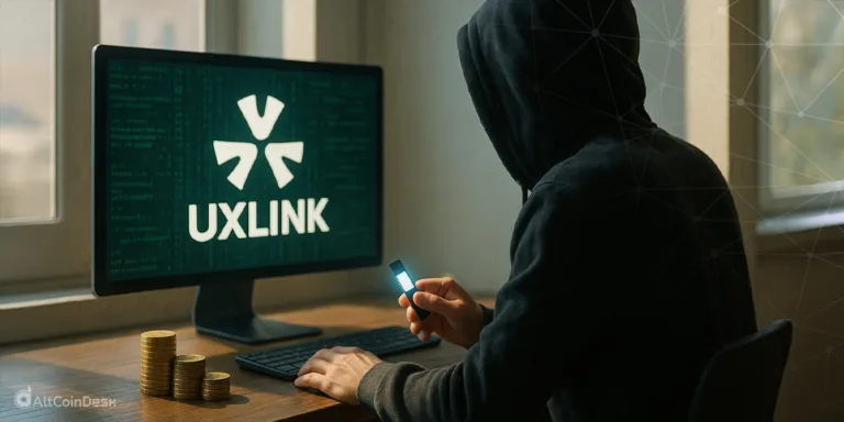 Hacker at computer showing UXLINK logo during UXLINK hack