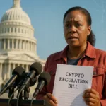 Woman holds a “Crypto Regulation Bill” document outside the Capitol during a Senate crypto bill press conference