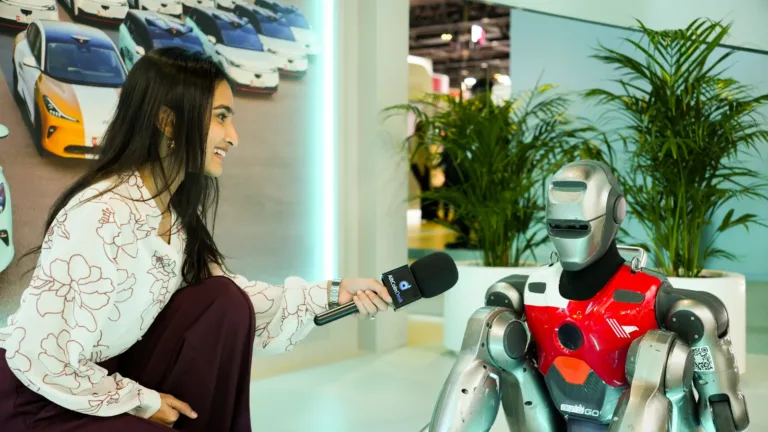 Reporter interviews humanoid robot at GITEX Global 2025